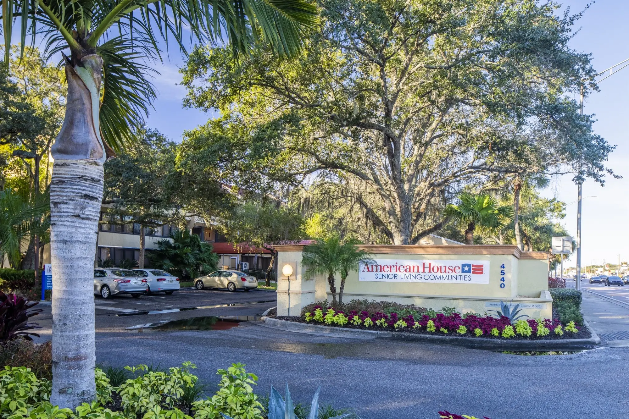 Exterior and sign of American House Sarasota, a retirement home in Sarasota, Florida